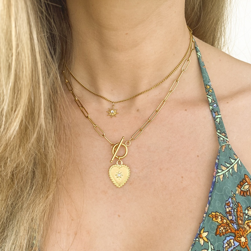 colgante corazon acero 2