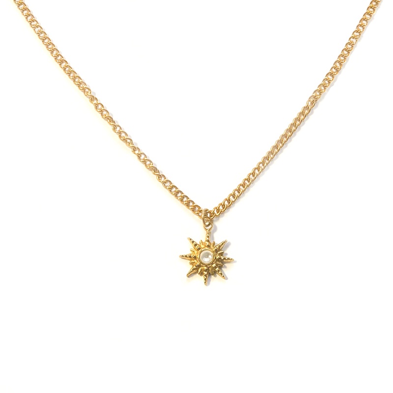 colgante mini estrella acero oro